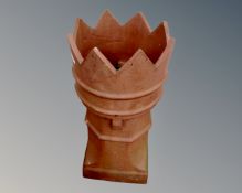 An antique crown chimney pot.