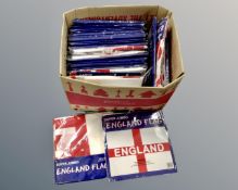 A box containing a quantity of England flags.