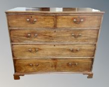 A George III mahogany two over three five-drawer chest.
