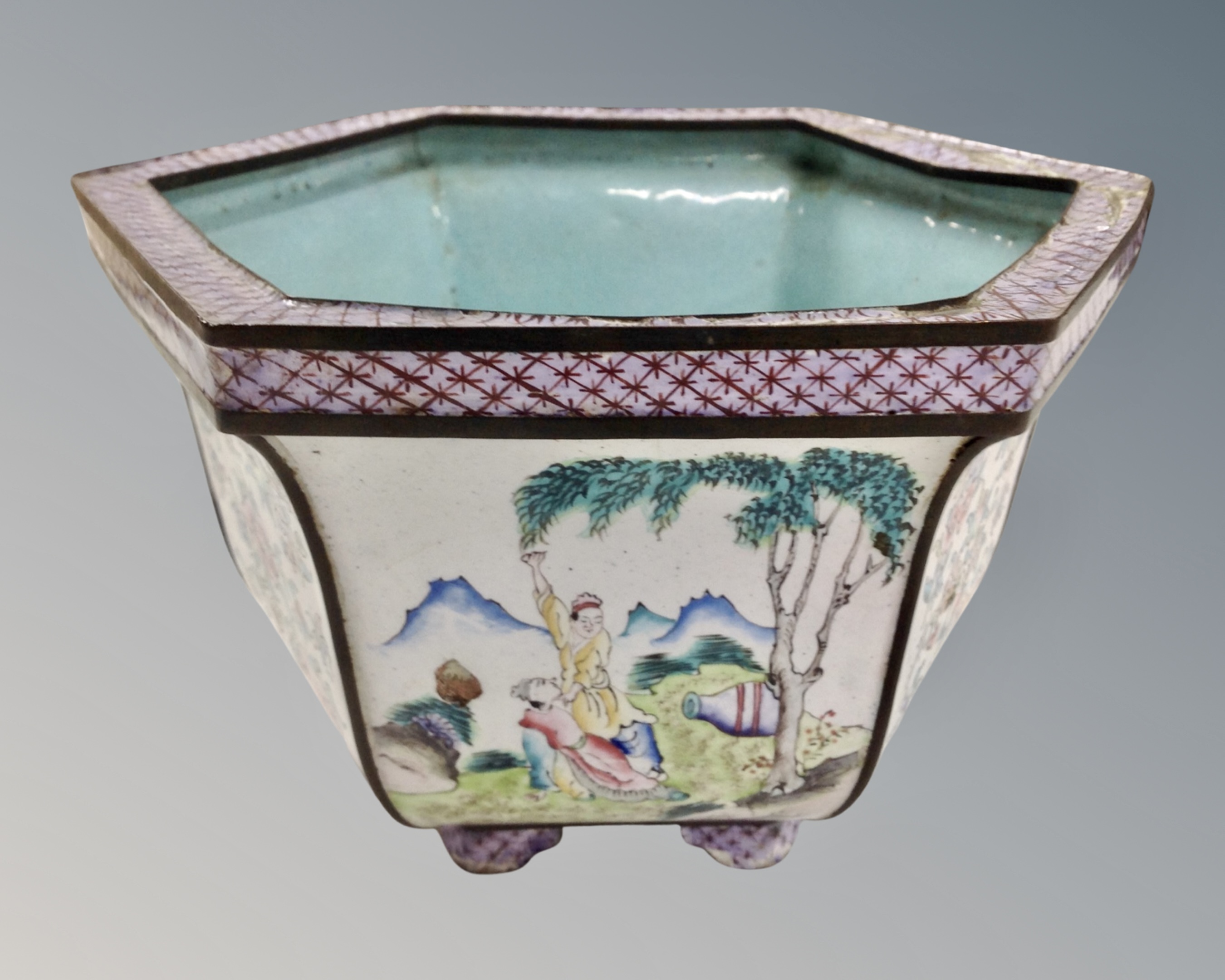 A Chinese enamelled metal hexagonal planter.