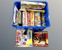 A box containing assorted board games.