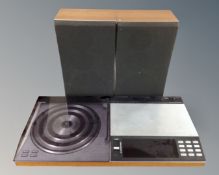 A Bang & Olufsen Beocenter 7000 with a pair of Bang & Olufsen Beovox X40 speakers.