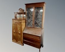 A Victorian inlaid mahogany bureau bookcase with astral glazed doors.