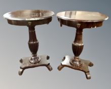 A pair of Continental oval pedestal work tables.