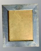 One crate containing twenty six 20 cm x 25 cm blue wood photo frames, all brand new.
