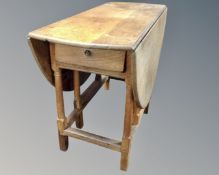 A 19th century gate leg table.