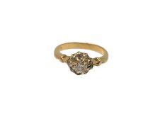 An 18ct gold diamond cluster ring, centre stone approx. 0.