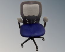 A contemporary office adjustable swivel armchair with fabric seat and mesh back.