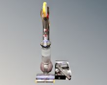 A Dyson ball animal II extra upright vacuum together with accessories