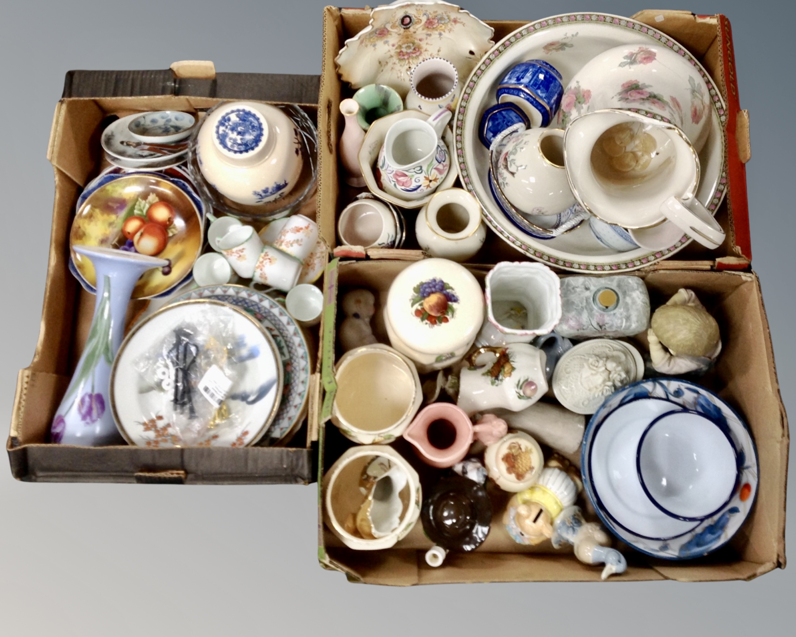 Three boxes containing assorted ceramics including wash jug and bowl, storage jars,