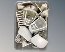 A box containing a quantity of contemporary wall lights.