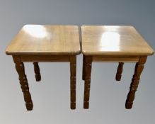 A pair of Scandinavian oak square occasional tables.