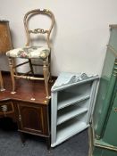 A painted open corner cabinet together with a beech wood bedroom chair.