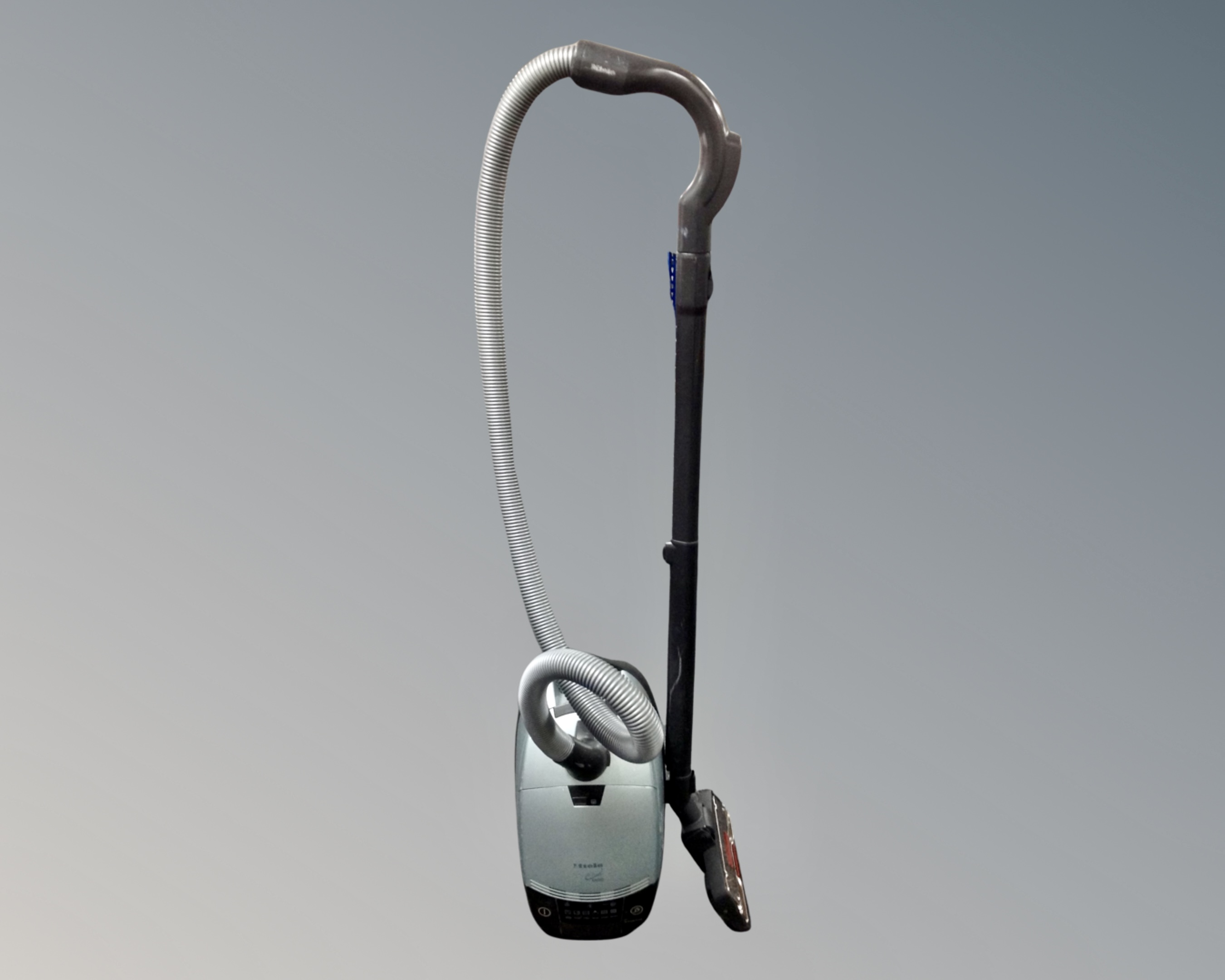 A Miele vacuum cleaner.