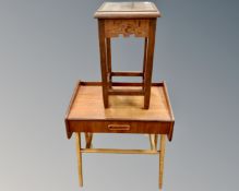 A mid-20th century teak bedside table fitted with a drawer and undershelf (width 48cm),