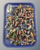 A tray of a large quantity of painted cast metal figures including soldiers, Native Americans etc.
