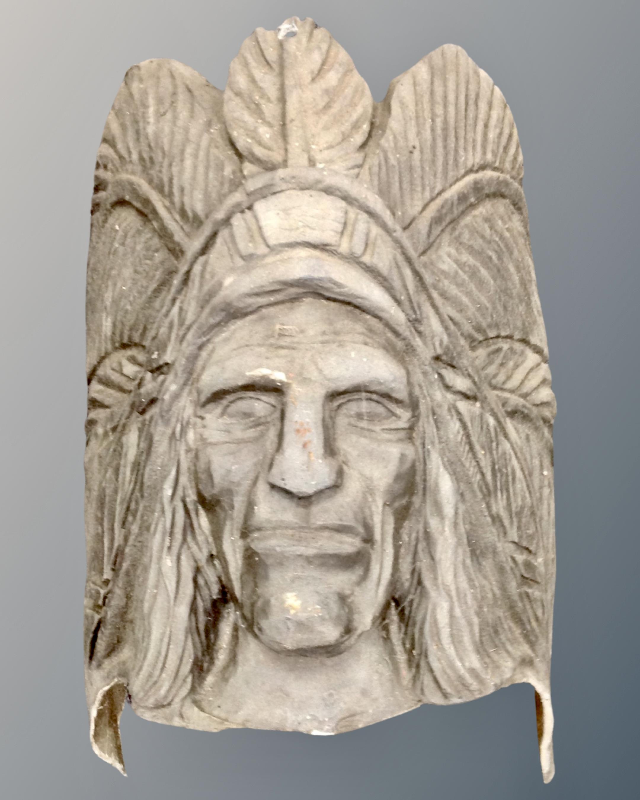 A fibreglass Native American head model.