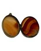 A Victorian pinchbeck and agate locket