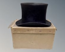A 19th century silk top hat by J Davison, Hatter and Hosier,
