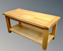 A contemporary oak rectangular two tier occasional table.