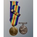 A First World War medal pair comprising British War Medal and Victory Medal named to 453744 PTE. D.
