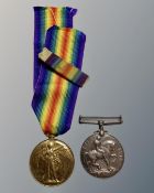 A First World War medal pair comprising British War Medal and Victory Medal named to 453744 PTE. D.