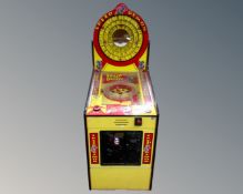 A Speed Demon arcade ticket machine.