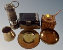 A box containing metalwares, miniature brass miner's lamp, vintage camera, treen pot etc.