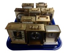 A tray containing 10 assorted battery operated carriage clocks.