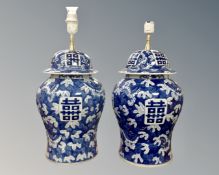 A pair of Chinese blue and white porcelain lidded vases converted to table lamps.