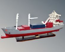 A model of bulk carrier on plinth.