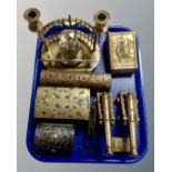 A tray containing a pair of brass cannons, trinket boxes, vesta case,