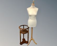 A circular beechwood wash stand together with a dressmaker's mannequin on tripod stand.