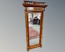 A Continental mahogany mirror, 81cm by 179cm.