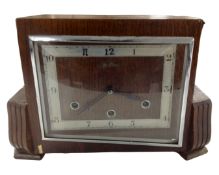 An oak cased Art Deco mantel clock.