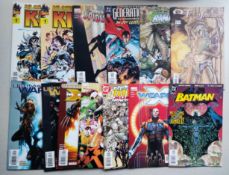 A collection of comics to include the band Kiss, Batman, The Amazing Spiderman and others.