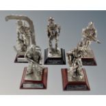 A group of five Royal Hampshire silvered metal figures depicting soldiers.