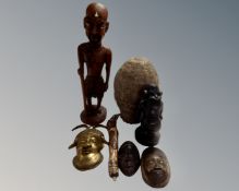 A tray of tribal items including South Seas warrior figurine, contemporary Benin bronze mask etc.