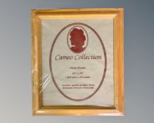 One crate containing thirteen Cameo Collection 12" x 10" pine photo frames,