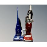 A Miele vacuum cleaner and a The Boss vacuum cleaner.