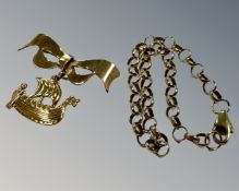 A 9ct yellow gold bracelet, 3.4g, together with a 9ct gold bow brooch, 2.9g (6.