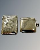 Two antique silver vesta cases.