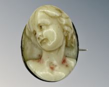 An antique gold backed cameo brooch, 2.5cm by 2cm.