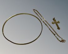 A Continental yellow gold bangle stamped 333 (3.2g), together with a 9ct gold crucifix pendant (0.