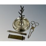 A silver ring tree together with silver plated sugar nips etc.