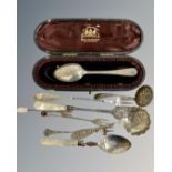 A collection of silver cutlery, pickle forks, cased spoon etc.