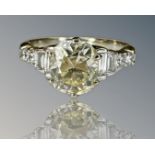 An 18ct yellow gold diamond ring, the central old cut stone approximately 1.