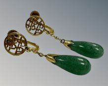 A pair of 14ct yellow gold Chinese jade earrings (2) CONDITION REPORT: Screw post