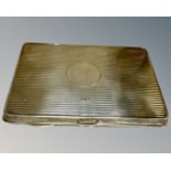 An antique silver card case, including silver pencil, Birmingham 1918 marks, 104.4g.