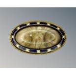 A Georgian gold and enamel memorial brooch, 32 mm x 20 mm.